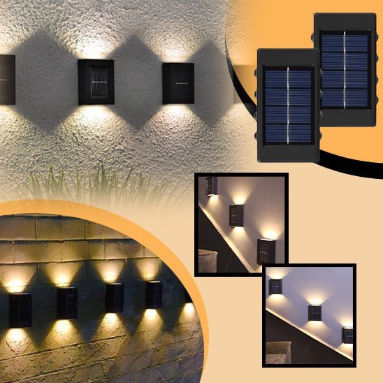 La Lampe solaire de jardin haut de gamme / Del-Sol™ est installée sur les murs extérieurs et diffuse une lumière chaude vers le haut et vers le bas. Les plans rapprochés et larges mettent en valeur les lumières, mettant en valeur le détail du panneau solaire en haut à droite.