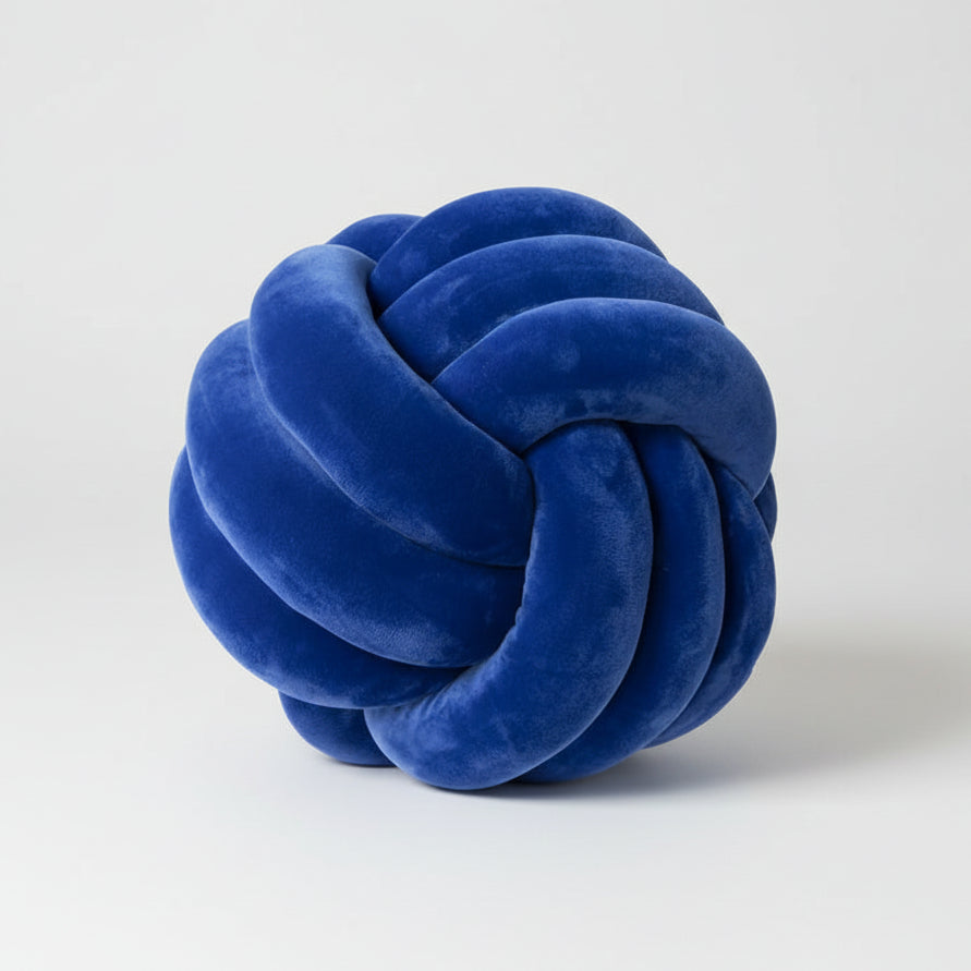 Coussin décoratif nœud bleu sur canapé ambiance salon moderne