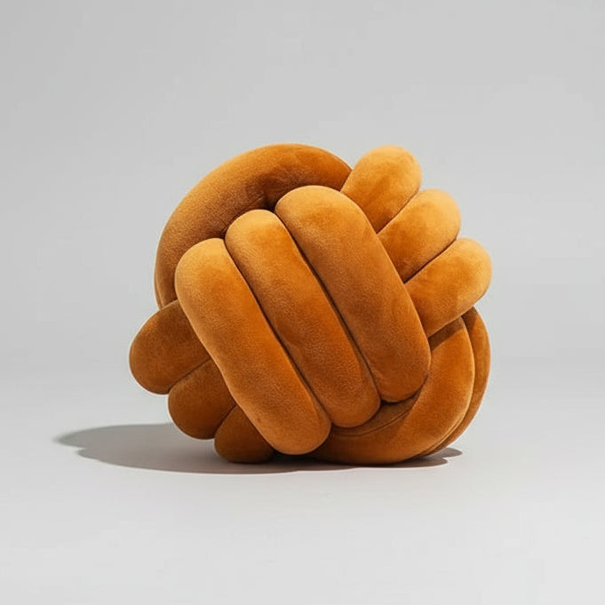 Coussin nœud velours caramel beige ambiance chaleureuse