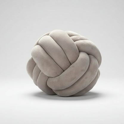 Coussin nœud velours doux texture détaillée gros plan