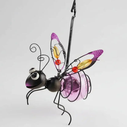 Décoration jardin abeille solaire lumineuse LED variante violet fer forgé noir ailes verre teinté violet ambre rose antennes spirale suspendue sculpture métal artistique