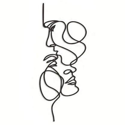 Décoration murale intérieure abstraite minimaliste en métal représentant deux visages stylisés.