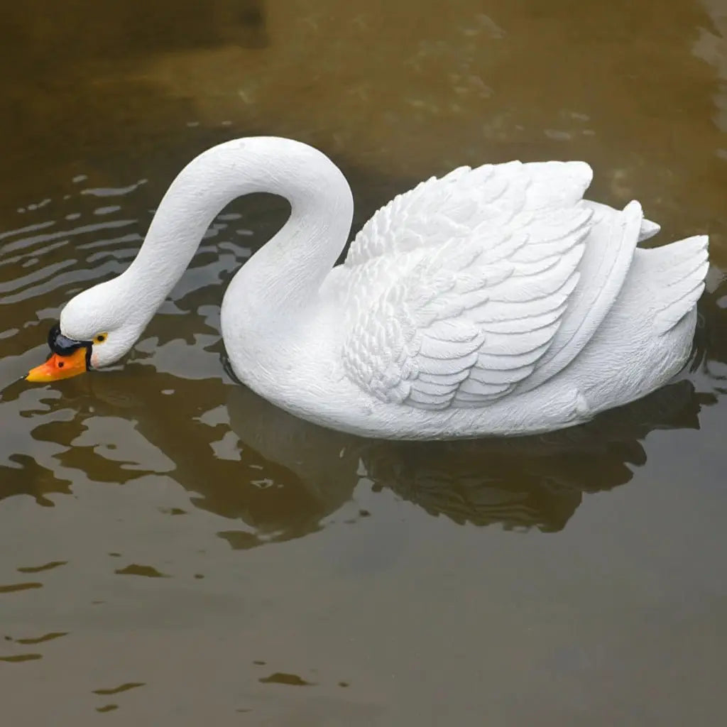 Décoration pour extérieur cygne résine blanc 28x12x12cm sculpture allongée élancée