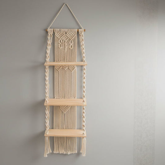 Détail deco murale macramé montrant nœuds tressés main texture coton naturel