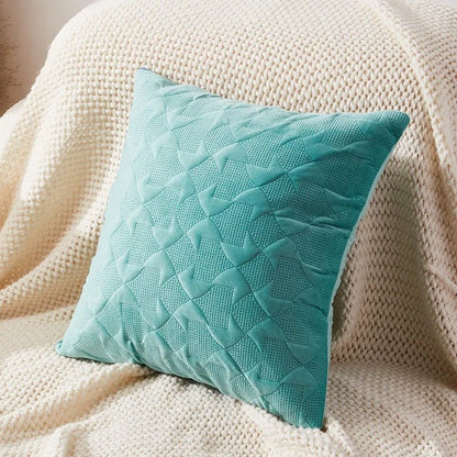 Détail texture laine et velours housse de coussin géométrique premium
