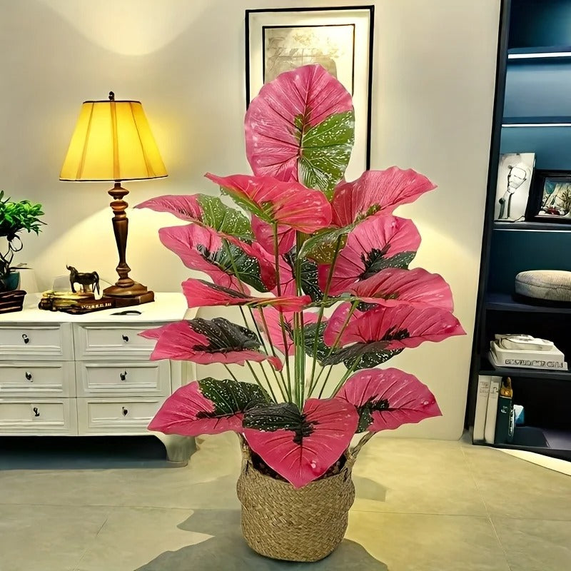 Grande plante artificielle rose vif, feuilles vertes, élégant intérieur moderne.
