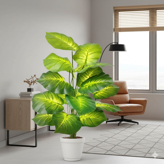 Plante Artificielle Haut de Gamme grande, feuilles vertes brillantes, pot blanc, intérieur lumineux.