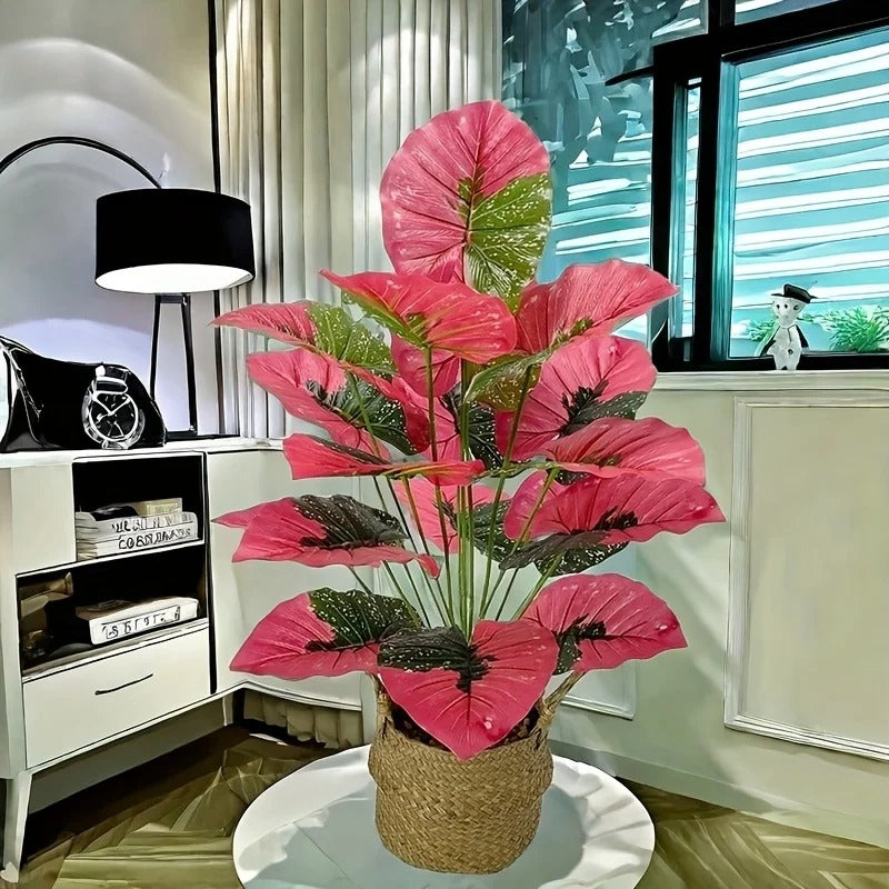 Grande plante artificielle rose éclatant avec feuilles vertes, décor intérieur élégant.