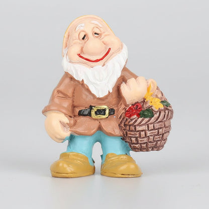 Nain de jardin rigolo jardinier panier fleurs colorées résine veste beige pantalon bleu sourire
