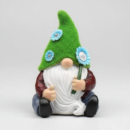 Nains de jardin doigt d'honneur assis fleur bleue chapeau vert flocqué
