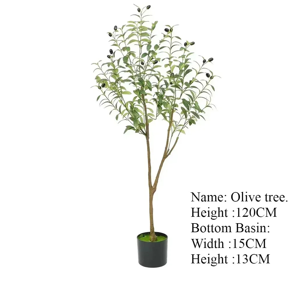 La plante artificielle d'extérieur Olive présente des feuilles vertes luxuriantes et des olives noires. Elle mesure 120 cm de haut et est livrée dans un pot noir (15 cm de diamètre, 13 cm de haut). Idéale pour apporter une touche méditerranéenne à votre jardin.