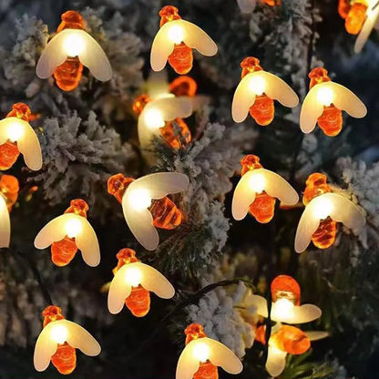 Guirlande solaire exterieur | Abeilles Solaires, créant une ambiance lumineuse dans un jardin ou un espace extérieur.