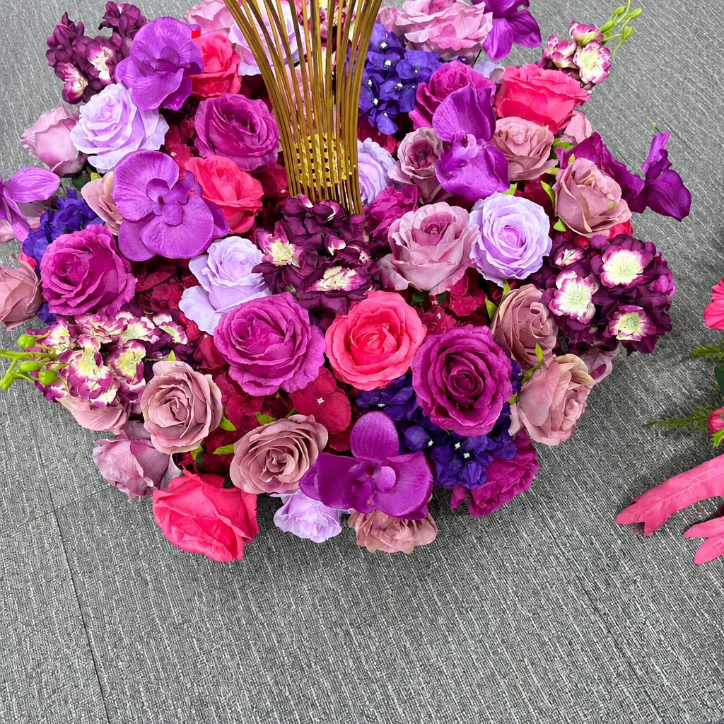 Couronne de fleurs artificielles fuchsia et violet avec orchidées