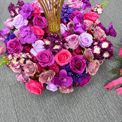 Couronne de fleurs artificielles fuchsia et violet avec orchidées