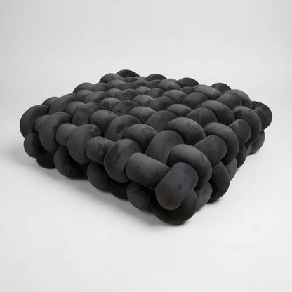 Grand coussin canapé velours noir charbon noué main design moderne