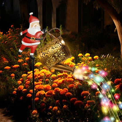 Père Noël solaire avec arrosoir LED cascade, décoration de jardin Noël, éclairage IP65, marque Mafrenesiedecoration.