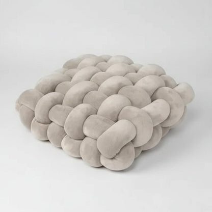 Grand coussin canapé velours gris noué main style scandinave minimaliste