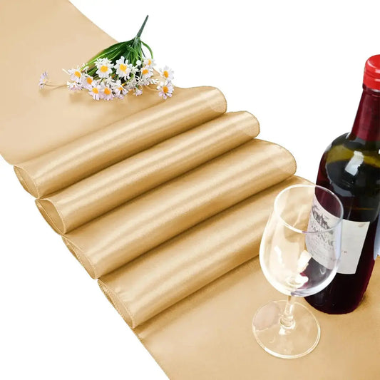 Chemin de table en satin doré Mafrenesiedecoration pour mariage et fêtes, 20 couleurs disponibles, décoration élégante et raffinée.