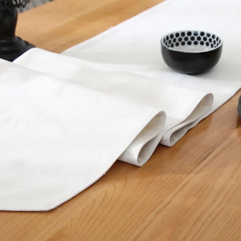 Chemin de table noir pompons coton 33x180cm table minimaliste