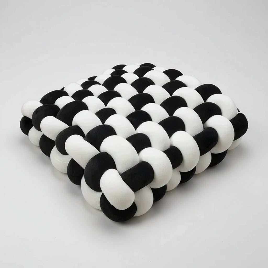 Coussin velours noué noir et blanc - contraste décoration moderne