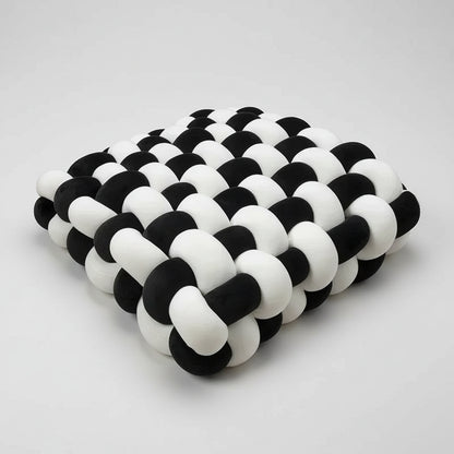 Coussin velours noué noir et blanc - contraste décoration moderne
