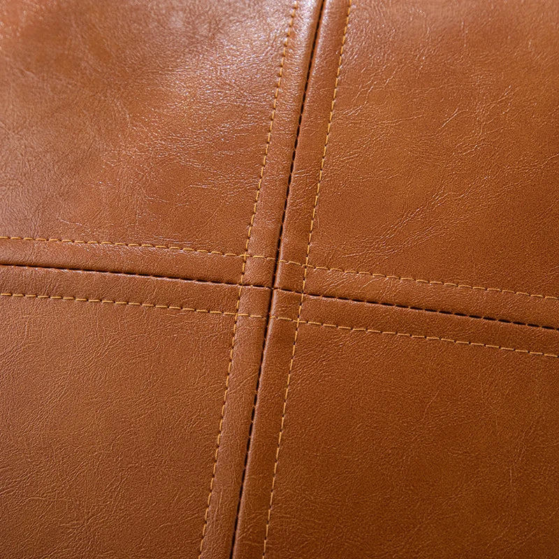 "Coussin blanc cuir synthétique coutures renforcées construction durable"