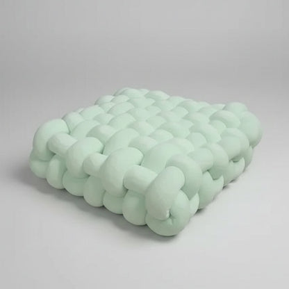 Grand coussin canapé velours vert clair noué main design doux