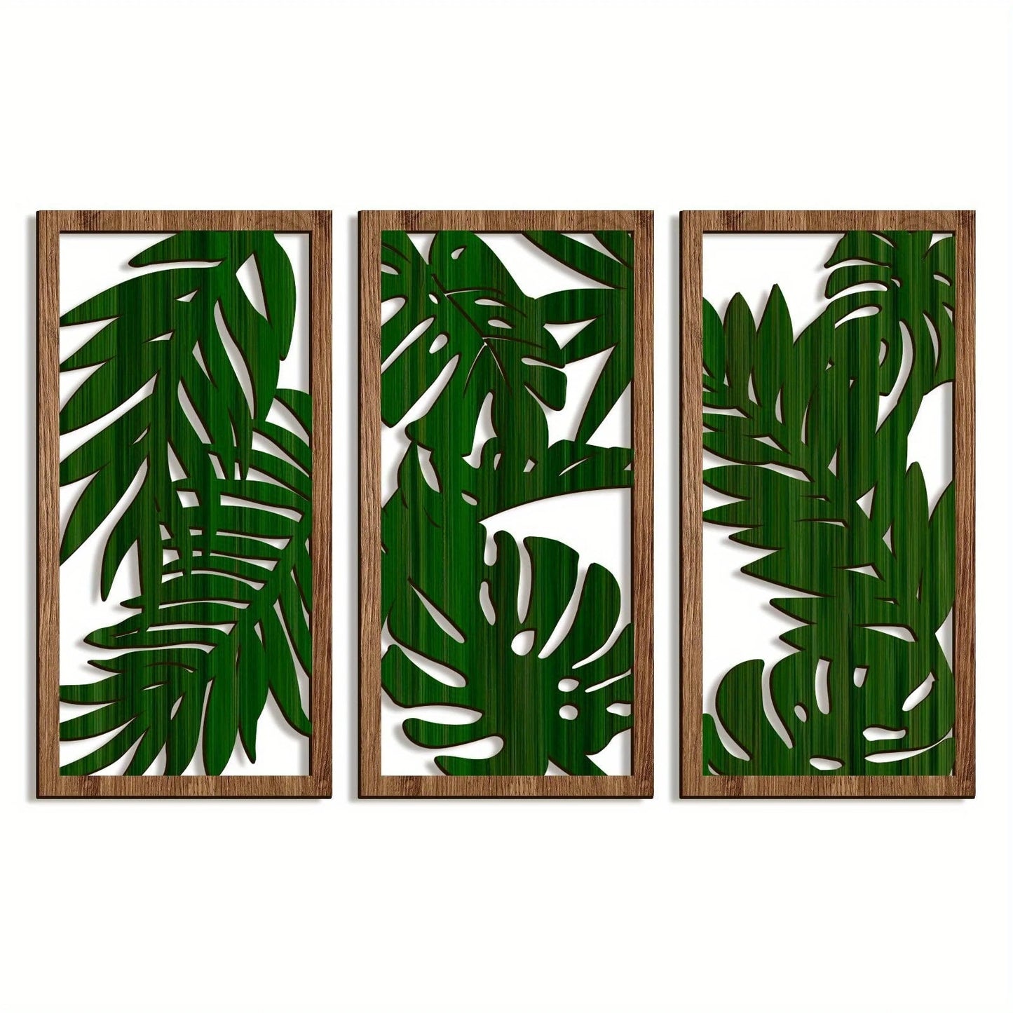 Trois panneaux de decoration murale en bois, motif feuilles tropicales vertes, style moderne.