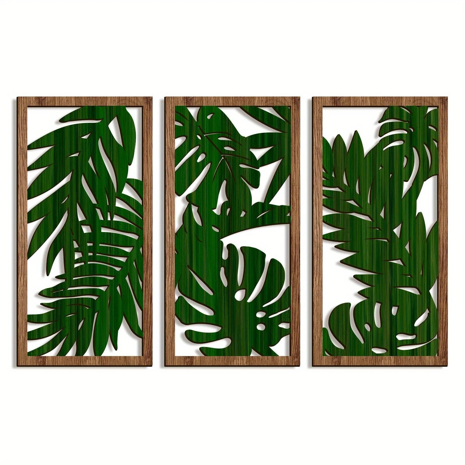 Trois panneaux de decoration murale en bois, motif feuilles tropicales vertes, style moderne.
