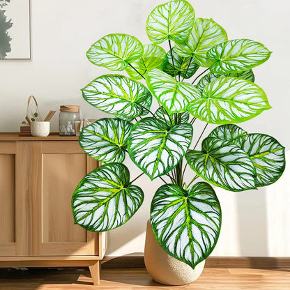 "Grande Plantes artificielles pour balcon lumineuse, motifs verts et blancs, intérieur moderne."