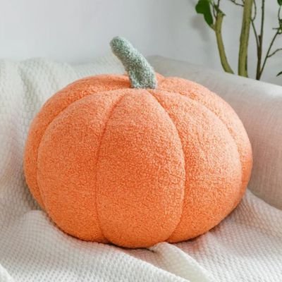 "Coussin citrouille XXL confortable en tissu bouclette pour décoration d'automne"