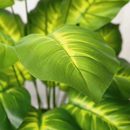 Détail plante artificielle intérieur haut de gamme texture feuille réaliste qualité luxe