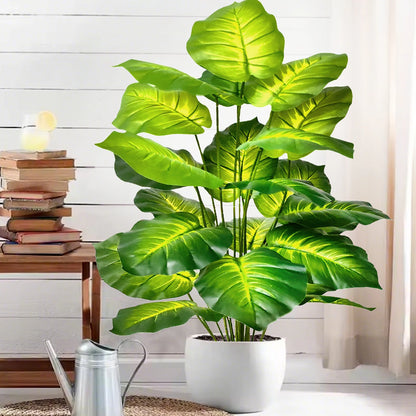 Grande Plante Artificielle Haut de Gamme verte, luxuriante, avec feuilles jaunes.