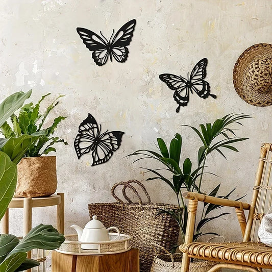 Decoration Murale Papillons en métal noir, ambiance intérieure bohème chic.